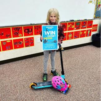 Apple Valley student wins a new scooter from Safe Routes Utah